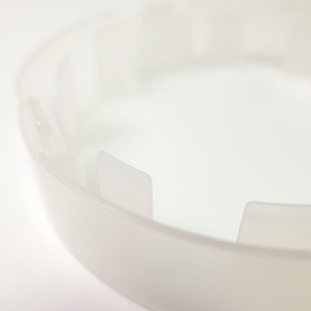 Close-up of eLX zero-movement retention tabs that limit lateral wafer movement