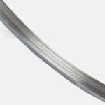 Thin-profile edge view of stacked metal film frames